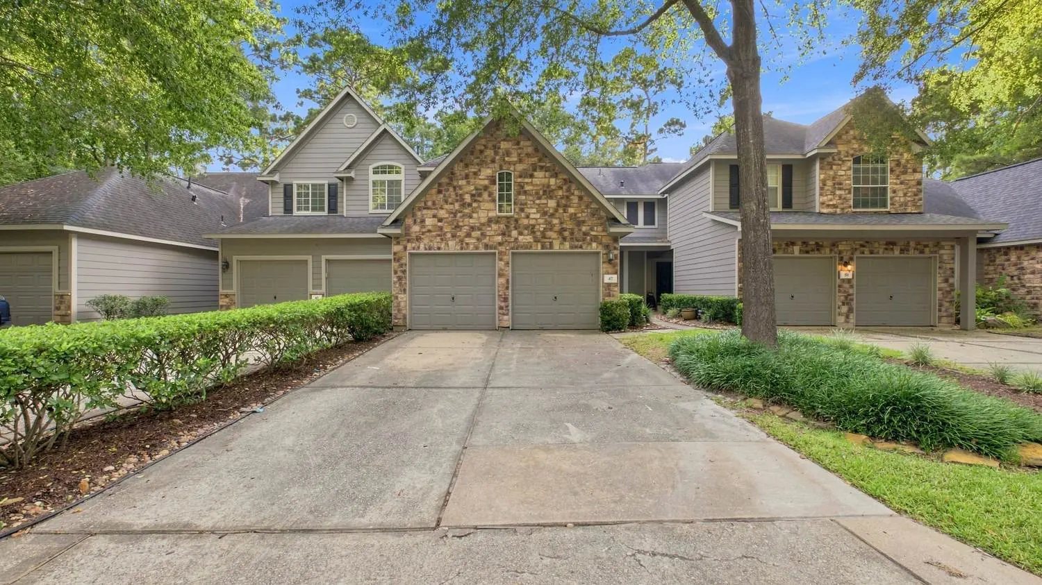 Two-storey home exterior photographed for a Houston area real estate listing